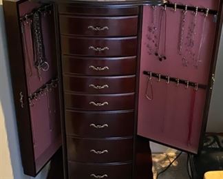Lot 3212 $95.00  Jewelry Armoire Chest w/ 8 Drawers and Side Cabinets  18" W x 15" D x 40" H	Very attractive and functional to keep your jewelry.
