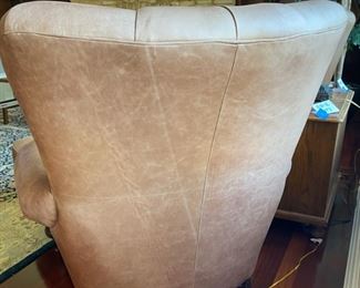 Lot 3183. $525.00  2 of 2  Classic Leather Chair and Ottoman with nailhead trim detail. Was $1950 new! Medium Brown	chair: 40"H to back x 29"D x 39"W  Seat: 19"H x 20"W x 22"D;  Ottoman: 22"w x 21"x 17"H	Note that the ottoman is quite faded and worn, however, there is a product on the market that will restore this leather to its original luster.  Set looks better than what it looks like in this bright location.  