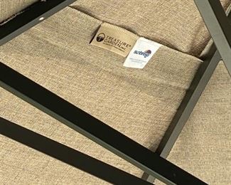 Lot 3150.  $1,200.00.  Smith & Hawken Patio Set & 8 chairs, cream cushions, plus umbrella and stand. The tabletop has mosaic details.   The owner paid $4500 + Cushion Price. + $569 for Umbrella (Sunbrella Fabric) View of Sunbrella Table on Umbrella.