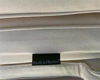 Lot 3150.  $1,200.00  Smith & Hawken Patio Set & 8 chairs, cream cushions, plus umbrella and stands. The tabletop has mosaic details.  Owner paid $4500 + Cushion Price. + $569 for Umbrella (Sunbrella Fabric). View of Label on Cushions, Smith & Hawken. BTW the cushions were ALWAYS kept indoors when not in use.  They are pristine.  