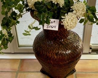 Lot 3164. $54.00  Large wicker urn with square wood base.  This lot includes the faux floral and greenery. 	29"H x 17"D	 