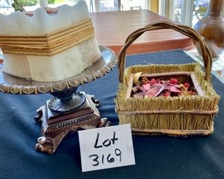 Lot 3169.  $28.00  Legacy candle plate with square 4-wick candle. Lot includes a cute, straw wrapped basket as well. 	