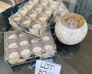 Lot 3214. $24.00  3 - packages of 12 Basic elements unscented votives in glass cups plus a shell mosaic candle/rose bowl.		