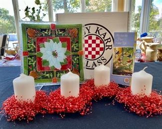 Lot 3218.  $65.00. Peggy Karr Poinsettia fused glass plate in box, plus 4 candles with red beaded cnadle rings from Anthropologie.  So nice great gift. 		