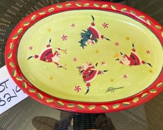 Lot 3219. $45.00 Counter Art Dancing Santas oval baker with lid that doubles as a tray/platter.  There is a liner inside the baker. 	