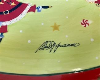 Lot 3219. $45.00 Counter Art Dancing Santas oval baker with lid that doubles as a tray/platter.  There is a liner inside the baker. 	