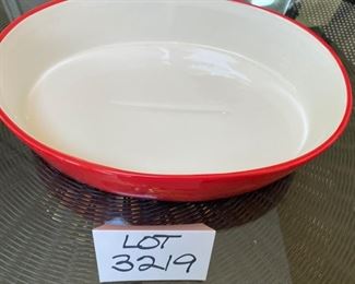 Lot 3219. $45.00 Counter Art Dancing Santas oval baker with lid that doubles as a tray/platter.  There is a liner inside the baker. 	