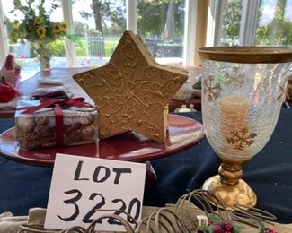Lot 3220. $32.00  8 Crate and Barrel Gold napkins and 8 Crate and Barrel  holly napkin rings ; Melrose International Co. red pedestal plate (12.5" x 8' x 3.5" t); Gold star shaped box with potpourri and a Holiday star footed hurricane.		