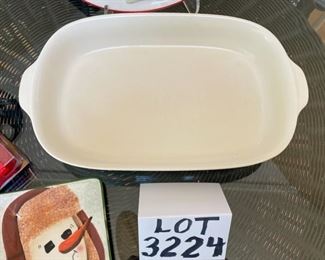 Lot 3224.  $36.00 Let it snow!!! Cute snowman accent and party ware.  Pfaltzgraf baking dish (13" x 8" x 2.5"); Snowman and Snow-woman votive w/snuffer; Hollyberry/Balsam tealights; oneida Snowman Plate (5.5" diam). and a cute Christmas plate " Made in Italy".