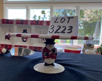 Lot 3223.  $32.00 Cute holiday party serveware.  Studio Nova 'Santa's Little Helper' 12" cake plate, divided relish tray and 4 section serve dish. (19.5" long