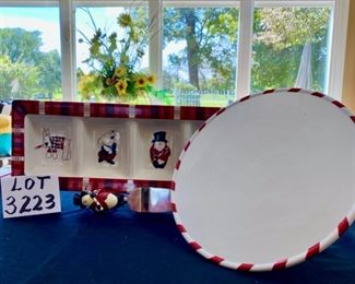 Lot 3223.  $32.00 Cute holiday party serveware.  Studio Nova 'Santa's Little Helper' 12" cake plate, divided relish tray and 4 section serve dish. (19.5" long