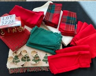 Lot 3226.  $50.00  24 Red, Green and Plaid Christmas Napkins (mostly from Crate and Barrel); 2 table runners (14x36 & 13 x 56); 1 square tablecloth (60x60) and 10 napkin holders.  You can't have too many!  	
