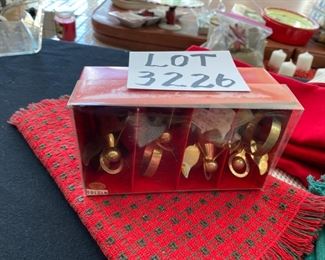 Lot 3226.  $50.00  24 Red, Green and Plaid Christmas Napkins (mostly from Crate and Barrel); 2 table runners (14x36 & 13 x 56); 1 square tablecloth (60x60) and 10 napkin holders.  You can't have too many!  	