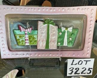 Lot 3225. $50.00.  A lovely assortment of mixed metal and glass holiday serving pieces, and very festive at that!  An 8" x 8" star dish by ARTHUR COURT; Lori Sievert for Silvestri hand blown rectangular Christmas plate (15" x 8.5"); so mod 17" x 7" Kromex silver tray and a cute 15" x 5.5" candy dish shaped like wrapped hard candy.  		