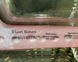 Lot 3225. $50.00.  A lovely assortment of mixed metal and glass holiday serving pieces, and very festive at that!  An 8" x 8" star dish by ARTHUR COURT; Lori Sievert for Silvestri hand blown rectangular Christmas plate (15" x 8.5"); so mod 17" x 7" Kromex silver tray and a cute 15" x 5.5" candy dish shaped like wrapped hard candy.  		