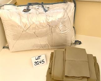 Lot 3245.  $65.00 Pacific Coast Queen Quilt and a set of Westpoint Stevens full sheets (includes 1 ea flat and fitted sheet and pillow case).