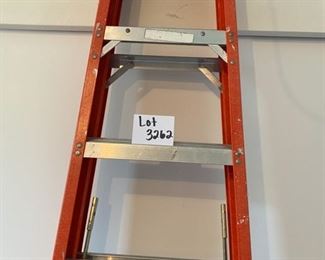 Lot 3262.  $75.00 Werner 8' fiberglass ladder.		
