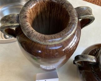 Lot 3266. $38.00  2 large pottery urns with handles by Melrose Gardens.		