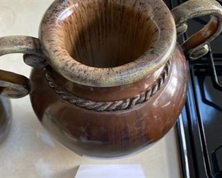 Lot 3266. $38.00  2 large pottery urns with handles by Melrose Gardens.		