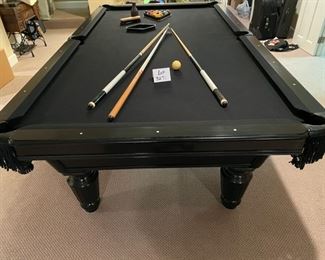 Lot 3271A. $975.00  AMF Play Master 8' regulation, slate top pool table.  This is a sleek black wood frame table with leather pockets and dramatic black felt top.  This lot includes 6 cues, 1 bridge, 1 set of billiard balls and table accessories. In great condition.  Ask us about the Pool Table Service, we use to deliver and assemble this pool table. This item will need to be professionally moved! 