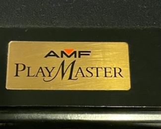 Lot 3271A. $975.00  AMF Play Master 8' regulation, slate top pool table.  This is a sleek black wood frame table with leather pockets and dramatic black felt top.  This lot includes 6 cues, 1 bridge, 1 set of billiard balls and table accessories. In great condition.  Ask us about the Pool Table Service, we use to deliver and assemble this pool table. This item will need to be professionally moved! 