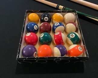 Lot 3271B. $70.00  1 set billiard balls-- look brand new and 2 mismatched pool cues.		
