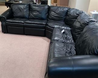 Lot 3274. $895.00 Super Sagles, Inc. 3 pc Leather sectional with Queen sleeper and wall saver recliner. Approximately 8' x 8.5' sides and 13'2" diagonal, height 32".