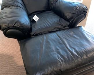 Lot 3275  $425.00. Black leather chair and ottoman.  This set is in good condition, clean and nice quality leather (not bonded).  Chair: 48"W  x  32"H x 36"D; Ottoman: 36"W x 22"D x 18" H	