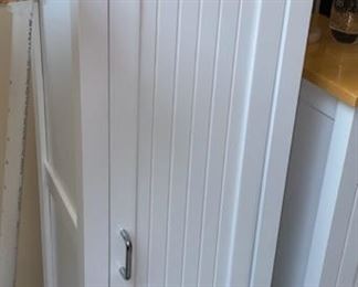 Lot 3284  $150.00   Pair of white and cabinets from Ikea with 5 shelves, natural birch finish top.   Will sell as a pair or separately.  $80.00 each if sold separately 16"W  x 15"D x 48"H