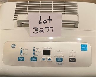 Lot 3277A. 1 of 2 $160.00 GE dehumidifier model ADEL70LRL2, 70pt capacity.  This dehumidfier comes with a 25' hose. Retails over $299.00 + $20.00 Hose  