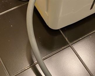 Lot 3277A. 1 of 2 $160.00 GE dehumidifier model ADEL70LRL2, 70pt capacity.  This dehumidfier comes with a 25' hose. Retails over $299.00 + $20.00 Hose  