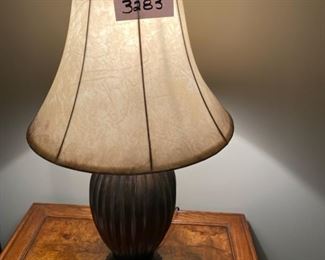 Lot 3283. $50.00  Imported lamp with bronze base and creamy taupe shade. 18"Diameter x 30"H