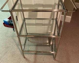 Lot 3289. $95.00 Tempered Glass and Chrome 3-shelf stand with towel bars on either side.  Heavy Duty and perfect for Bathroom, Bar, Laundry Room or really anywhere.	23"W x 12.5" D x 28"H