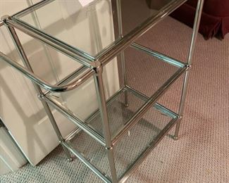 Lot 3289. $95.00 Tempered Glass and Chrome 3-shelf stand with towel bars on either side.  Heavy Duty and perfect for Bathroom, Bar, Laundry Room or really anywhere.	23"W x 12.5" D x 28"H