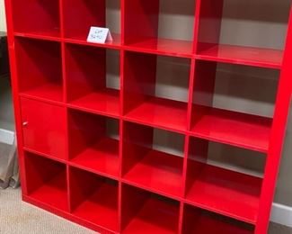 Lot 3290. $80.00 Red Ikea Expedit or Kallax #14729, 16 cube storage unit with double drawer insert. 59"w x 15.5"d x 59"t	 Will need to be disassembled to be removed by the purchaser. 