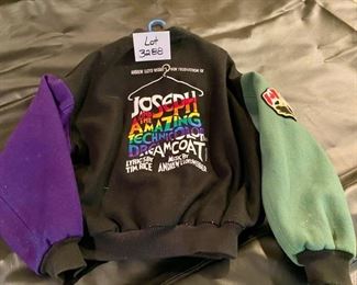 Lot 3288.  $85.00 Roots Sporting Goods, XL "Joseph & Technicolor Dream Coat" wool, varsity style stage jacket for cast and crew members. 