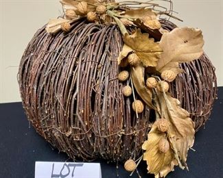 Lot 3294.  $28.00.   One Cute, natural vine pumking with oak leaf accent. 16.5" H x 16" D		
