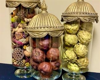 Lot 3296. $180.00 for all three covered, pedestal jars, the tops are ornate and very heavy. These jars are filled with quality potpourri, artichokes, pomegranates and lovely botannicals. Sizes:  24"Hx 8", 21"H x 8", 19"H x 8".		