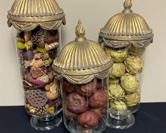 Lot 3296. $180.00 for all three covered, pedestal jars, the tops are ornate and very heavy. These jars are filled with quality potpourri, artichokes, pomegranates and lovely botannicals. Sizes:  24"Hx 8", 21"H x 8", 19"H x 8".		