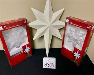 Lot 3304.  $52.00 for all  2 - 11" Color changing, LED Star tree toppers New in Box, (originally $35-$40 ea) and 1- glitter, white hanging star 