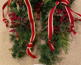 Lot 3306. $75.00 for  2 - Holiday Swags, 30" tall with red ribbons and pinecones. 		