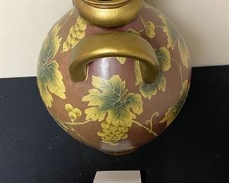Lot 3313  $95.00   Beautiful accent/. home decor urn. Burnished red and gold, design for Toyo by Raymond Waites.  Orig. Cost  $179.00 at O'Brien Florist.