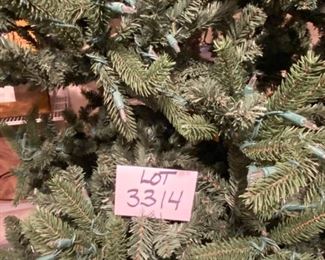 Lot 3314.  $125.00. Beautiful and in great shape, Pre-lit 10' Christmas Tree. 	
