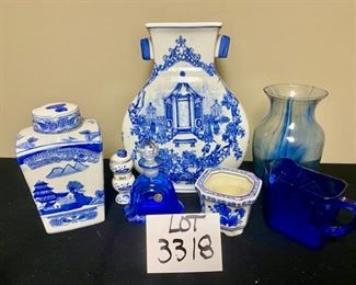 Lot 3318.  $48.00  A Blue & White Bonanza!!!  Includes 6 groupings:  13' x 8.5" x 3.5", Formalities Urn;  Perfume bottle with stopper cobalt blue, bell shape "Collegian Galss Line" Italy; Salt Shaker from Japan; Ginger Jar 8" tall; Candle 3" "Bombay"; Clear Glass & Blue Swirl vase 8" tall; Small bluie pitcher 4" x 5.75"		