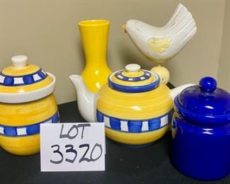 Lot 3320. $32.00 5 pc. Yellow & Bllue Tableware- 2 covered jars, 1 teapot, 1 yellow vase and a wooden bird. All in great shape.		