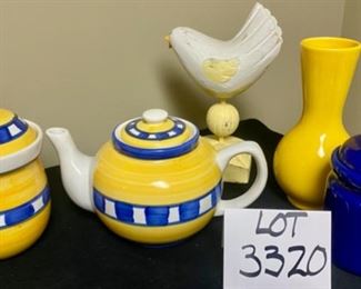 Lot 3320. $32.00 5 pc. Yellow & Bllue Tableware- 2 covered jars, 1 teapot, 1 yellow vase and a wooden bird. All in great shape.