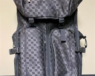 Lot 3321  $40.00  Sisely Luggage.  2 Wheels w/Handle Bar, multiple pockets and compartments 14"W  x  22" H	