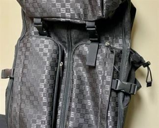 Lot 3321  $40.00  Sisely Luggage.  2 Wheels w/Handle Bar, multiple pockets and compartments 14"W  x  22" H