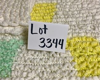 Lot 3344  $20.00   Very cute  hand crocheted baby blanket, white, green and yellow, Fun ruffled detail/ CLEAN and NICE!	68"L x 38"W	