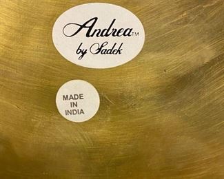 Lot 3350.  $38.00.  Vintage Brass Lot. The star of the show is this brass footed trinket box with swan finial from Andrea by Sadek (7.5 x 7.5 x 5.5"h) also includes a brass candlestick (12"h), brass chamber candle holder (4"), brass pot by Hosley, and a double-handled challis with "W" and 211 on the bottom.		